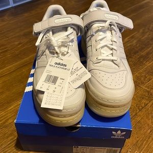 Women’s size 10 Adidas Triple Platform shoes.  NWT